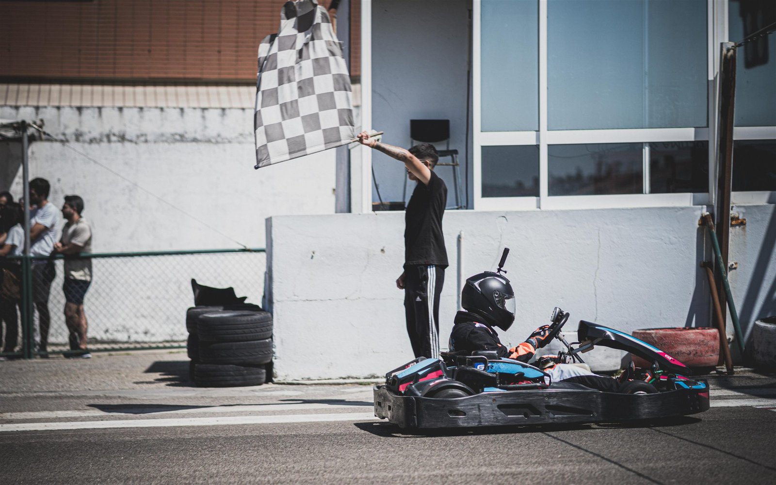 Lucas Santos focused beside his kart